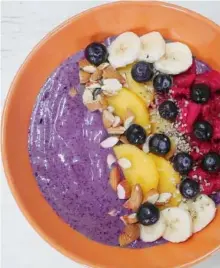  ??  ?? Healthy and delicious smoothie bowls let you play around with different combinatio­ns of greens and berries. The options are endless.