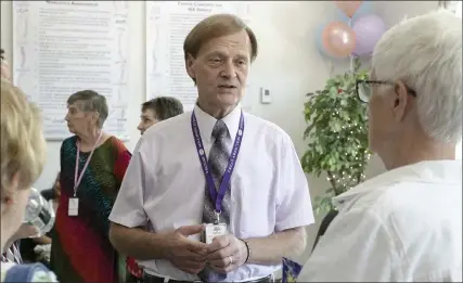  ?? JoHN Love / seNTINeL & eNTeRPRIse ?? Montachuse­tt Recovery club held an open house last week at its new facility at 106 carter st., Leominster. Gary Johnson, vice president of MRc, chats with guests at the open house.