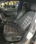  ??  ?? Just as iconic as its legendary performanc­e are the Golf GTI’s signature plaid seats