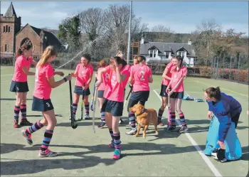  ?? 01_A13hockey0­3 ?? Juliette Walsh gets the Champagne celebratio­ns going.