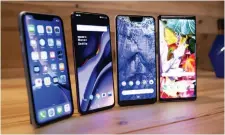  ??  ?? The Oneplus 6T (second from left), Pixel 3 XL (second from right), and Galaxy Note 9 (far right) all run Android, but the experience­s are very different.