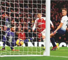  ?? Reuters ?? Arsenal’s Lucas Torreira scores the fourth goal against Tottenham at Emirates Stadium yesterday. The Gunners rallied from being 2-1 down to win 4-2.