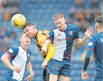  ?? ?? East Fife’s Sean Brown challenges Liam Dick for this high ball