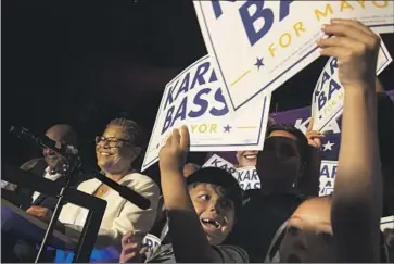  ?? Brian van der Brug Los Angeles Times ?? REP. KAREN BASS, shown speaking on election night, is the front-runner to become L.A. mayor, with a seven-point lead over real estate developer Rick Caruso. The two will battle it out in the Nov. 8 runoff election.