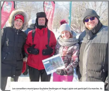  ?? —photo Frédéric Hountondji ?? Les conseiller­s municipaux Guylaine Desforges et Hugo Lajoie ont participé à la marche. Ils sont ici avec Jessie Gagnon et Marcel Groulx.