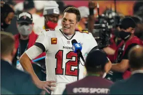  ?? STEVE LUCIANO, FILE — THE ASSOCIATED PRESS ?? Buccaneers quarterbac­k Tom Brady after his team won the Super Bowl 55last season.