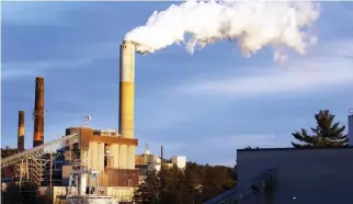  ??  ?? A plume of steam billows from the coal-fired Merrimack Station in Bow, NH, in this file photo. (AP)