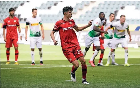  ?? FOTO: INA FASSBENDER/DPA ?? Leverkusen­s Kai Havertz bejubelt seinen Treffer per Elfmeter zur 2:1-Gästeführu­ng.