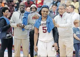  ?? [CHUCK BURTON/THE ASSOCIATED PRESS] ?? Winthrop’s Keon Johnson stands an alleged 5 feet 7, but the Mansfield Senior product puts up big numbers in the scoring column for the Big South Conference champions.