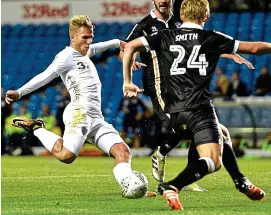  ??  ?? Make mine a treble: Saiz hits his third goal of the night