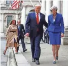  ?? FRANK AUGSTEIN/AP ?? President Trump, Theresa May, first lady Melania Trump and May’s husband, Philip.