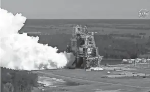  ?? NASA VIA AP ?? The core stage of the Space Launch System is tested at the Stennis Space Center near Bay St. Louis, Miss., on Thursday.