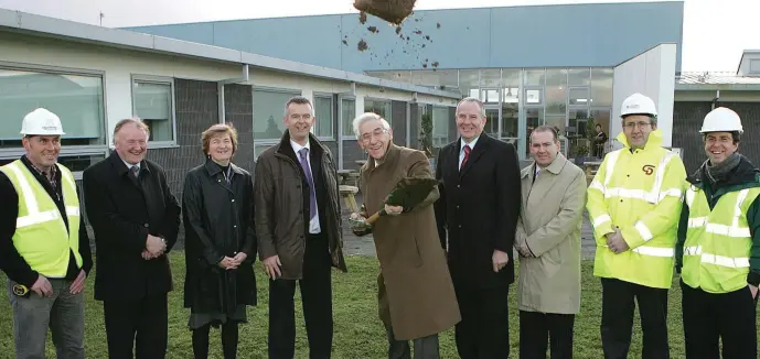  ??  ?? Jimmy Mulroy turns the sod, with some vigour, to launch the the new extension at DIFE. Also pictured are Ciaran Farrell, Dan Toole, Aileen Conry, Davey McDonnell, Padraig Kirk, Greg Donaghy and Matt McDonagh.