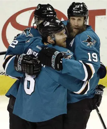  ?? BEN MARGOT/THE ASSOCIATED PRESS ?? The Sharks celebrate a Joe Pavelski goal during first-period action against Nashville Thursday night in San Jose.