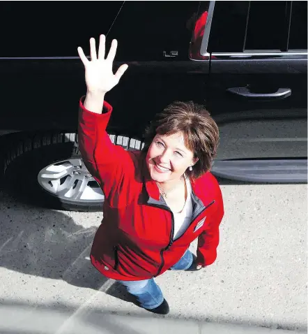  ?? — PHOTOS: THE CANADIAN PRESS FILES ?? B.C. Liberal Leader Christy Clark on the campaign trail in Saanich earlier this month. Clark has an eye for the camera, even if it isn’t coming at her from eye level.