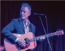  ?? Howard Reynolds/ ?? Lyle Lovett performs at a benefit for KPFT at Anderson Fair, where he played in the formative years of his career.
