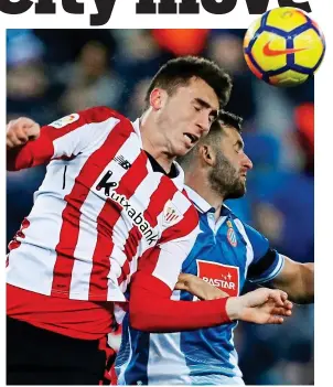  ?? EPA ?? Change of heart: Laporte (left) is now ready to join Guardiola