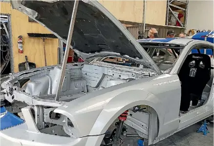  ?? SUPPLIED ?? The electric Crazy-e-Horse Mustang in the early stages of constructi­on.