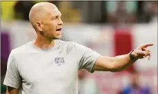  ?? Andre Penner / Associated Press ?? U.S. head coach Gregg Berhalter follows the action during Friday’s match against England.