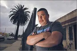  ?? Mark Boster Los Angeles Times ?? JANITOR Jose Tadeo Gamez Flores can’t sue over unpaid wages because when he was hired he signed away his right to file a lawsuit against his employer.