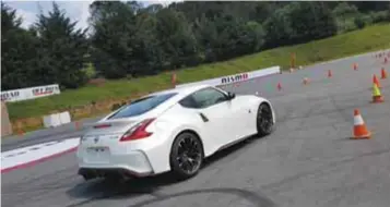  ?? | MARIO ROSSI ?? El Nissan 370 Z NISMO lució su mejor forma en la pista. Las capacidade­s dinámicas son extraordin­arias.