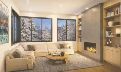  ?? ?? An artist's rendering shows the great room in a townhome at Nordix Panorama, where families can gather and get cosy after a day on the slopes.