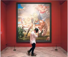  ??  ?? The exhibition also showcases the star’s final commission­ed portrait Equestrian Portrait Of King Philippe II by Kehinde Wiley, in which the singer sits on horseback, while two angels – one white, one black – wrestle above his head.