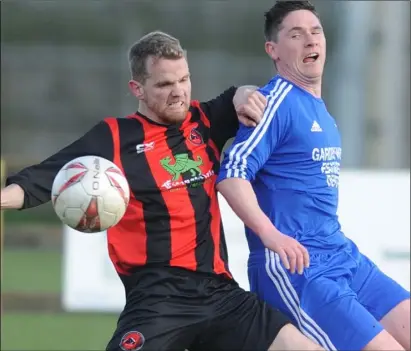  ??  ?? Owen Armstrong, left, netted Bellurgan’s first two goals against Trim Celtic.