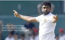  ??  ?? Sri Lanka’s Dilruwan Perera celebrates after he dismissed South Africa’s Dean Elgar. — AFP