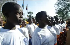  ?? Roberta Pennington / The National ?? Pupils from St Katherine Secondary School in Uganda sing to welcome officials from Dubai Cares