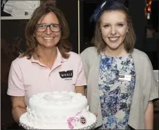  ??  ?? Lisa Toner and Grace Barry with their cake by Treats to You.