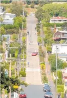  ?? Photo / File ?? Dunedin’s Baldwin St (puff) is the (pant) steepest (wheeze) in the (gasp) world.