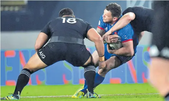  ?? Photo / Photosport ?? The French team thought Ofa Tuungafasi (left) and/or Sam Cane should have been sinbinned for this double tackle on Remy Grosso.