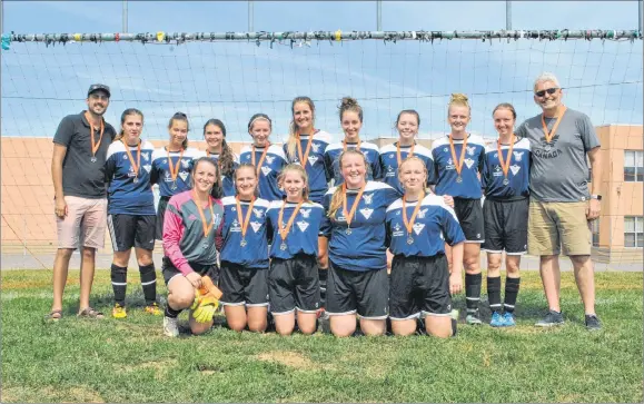 ??  ?? The Northern Nova United Falcons U17 girls team won silver at the Bruce Wagner Memorial Tournament this weekend. In front from left are: Megan MacKenzie, Victoria Dunn, Hayley Nichol, Tess Murray, Jenny Ferrara. Missing from the photo are KJ Emery, Tori Whittemore and Alma Ianta. In back from left are: coach Zachary Langlois, Abbey Munroe, Anastasia van Zyl, Madison Bond, Emily MacKenzie, Alicia Thomsen, Madeline Schnare, Emma Martin, Georgia Murray, Maya Goldchtaub and coach Sean Murray.