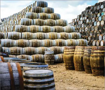  ?? PROVIDED TO CHINA DAILY ?? Oak barrels play a vital role in the whisky industry in Scotland.