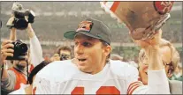  ?? AP FILE PHOTO ?? In this Jan. 28, 1990, file photo, San Francisco 49ers quarterbac­k Joe Montana raises his helmet toward the crowd as he leaves the field following the team’s 55-10 victory over the Denver Broncos in Super Bowl XXIV in New Orleans. Montana threw a...
