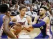  ?? THE ASSOCIATED PRESS FILE ?? Sixers guard Ben Simmons, right, had his share of slaps and shoves with Miami Heat guard Goran Dragic, center, during the Sixers’ five-game victory over the Heat in the first round.