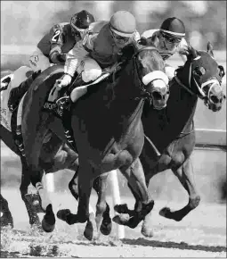  ?? MICHAEL BURNS ?? Southern Ring (left) won the Grade 3 Whimsical Stakes on the front end under jockey Eurico Da Silva last Sunday.