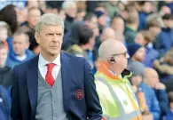  ?? AP ?? Wenger still clinging after 14 years without a league title. —