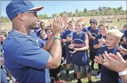  ?? Dan Watson/The Signal ?? NFL running back and Valencia High School graduate Shane Vereen motivates participan­ts at Valencia High on a recent Saturday during Playmaker Football Camp, which benefits Children’s Hospital Los Angeles.