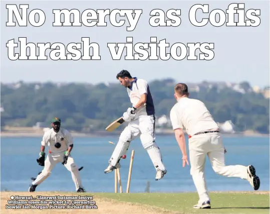  ??  ?? ● Howzat... Llanrwst batsman Iestyn Williams loses his wicket to Caernarfon bowler Ian Morgan Picture: Richard Birch