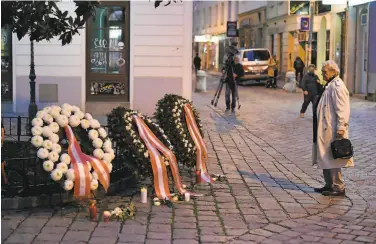  ?? Thomas Kronsteine­r / Getty Images ?? The Austrian government laid wreaths at the scene of a deadly shooting spree in Vienna’s city center.