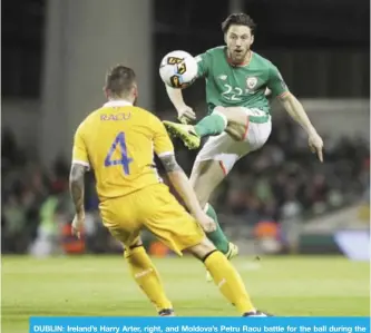  ??  ?? DUBLIN: Ireland’s Harry Arter, right, and Moldova’s Petru Racu battle for the ball during the 2018 World Cup qualifying, group D match at the Aviva Stadium, Dublin, Ireland, Friday. — AP