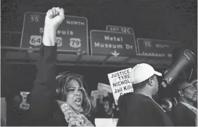  ?? CHRIS DAY/THE JACKSON SUN ?? Demonstrat­ors block traffic on Interstate 55 near the Memphis-arkansas Bridge as they protest the killing of Tyre Nichols on Jan. 27 in Memphis.