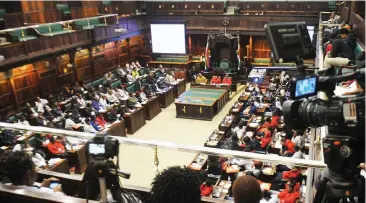  ?? Picture: Courtney Africa/African News Agency (ANA) ?? YOUNG VOICES: Sinovuyo Mankayi from Cape Town, Abongile Xhantini from Johannesbu­rg and Seluleko Ndlovu from Durban, who presided as Speaker for the Nelson Mandela Children’s Fund Youth Summit. They held their own version of Parliament in the Old...