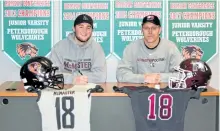  ?? SUBMITTED PHOTO ?? Peterborou­gh Wolverines linebacker Connor Murney, left, signs his letter of intent to attend McMaster University in Hamilton with Marauders head coach and Peterborou­gh native Greg Knox looking on Sunday at the Peterborou­gh Wolverines Clubhouse on High...