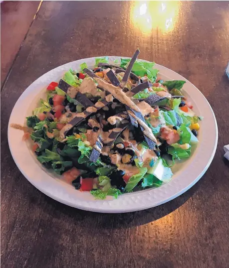  ?? DONNA OLMSTEAD/FOR THE JOURNAL ?? The chopped salad at The Acre is topped with a zippy chipotle vegan ranch dressing.