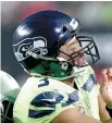  ??  ?? Le quart des Seahawks de Seattle, Russell Wilson. - Associated Press: Ross D. Franklin