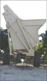  ?? BEA AHBECK/NEWS-SENTINEL ?? Equipment sits ready for grape harvesting outside Lodi on Tuesday.