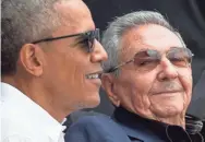  ?? MICHAEL REYNOLDS/EPA ?? President Obama and Cuban President Raúl Castro attend a Major League Baseball exhibition game between the Tampa Bay Rays and the Cuban national team in Havana on March 22, 2016. Critics say Obama’s policies of openness were of little benefit as “Cuba...